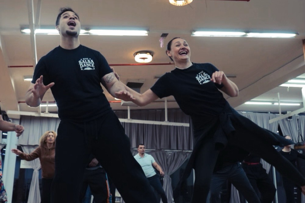 Instructors leading a Mambo class at NYC Salsa Dance in Bushwick, Brooklyn